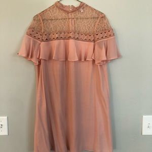 Express dress. Used once for a wedding. Dry clean.